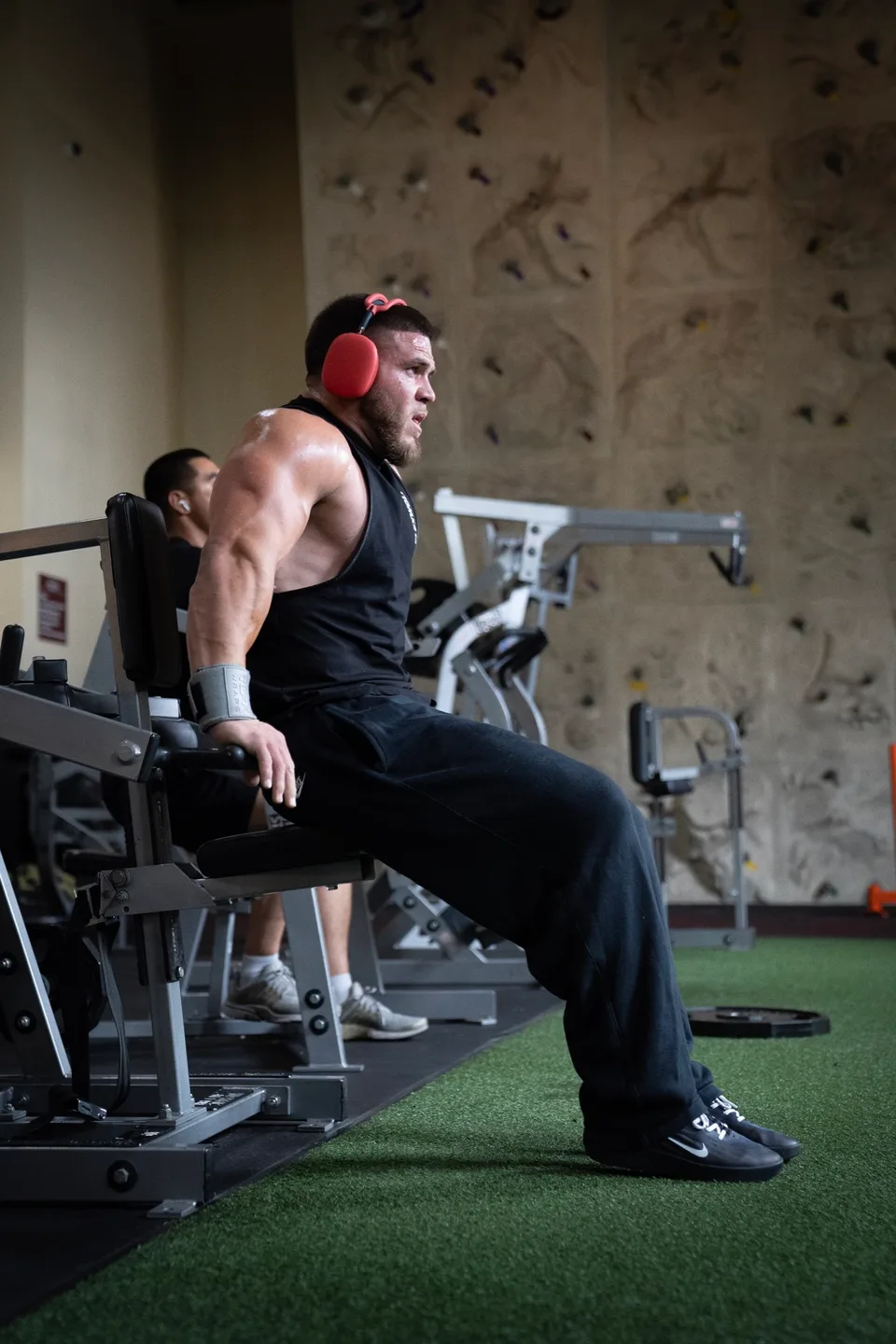 Athlete resting between strength training sets