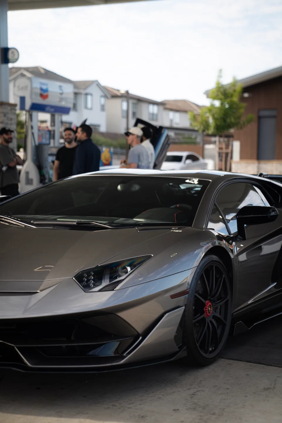 Gray Lamborghini photographed at the station